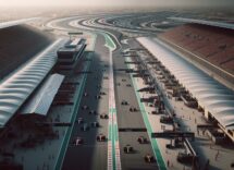 F1 cars racing at the Bahrain Grand Prix under bright lights